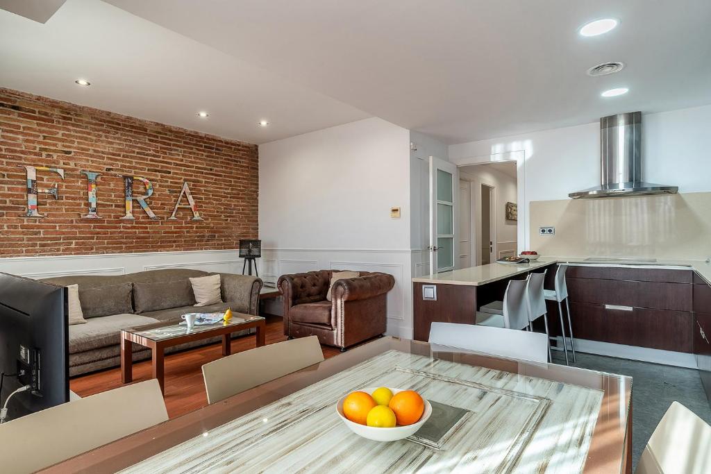 Kuchyň nebo kuchyňský kout v ubytování Enjoybcn Fira Apartment