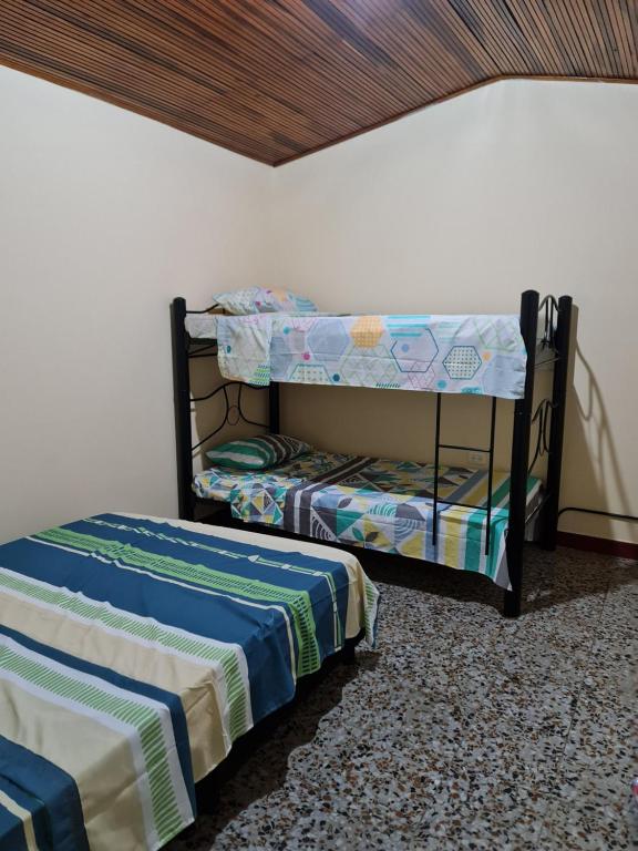 Postel nebo postele na pokoji v ubytování EL CACIQUE VILLETA