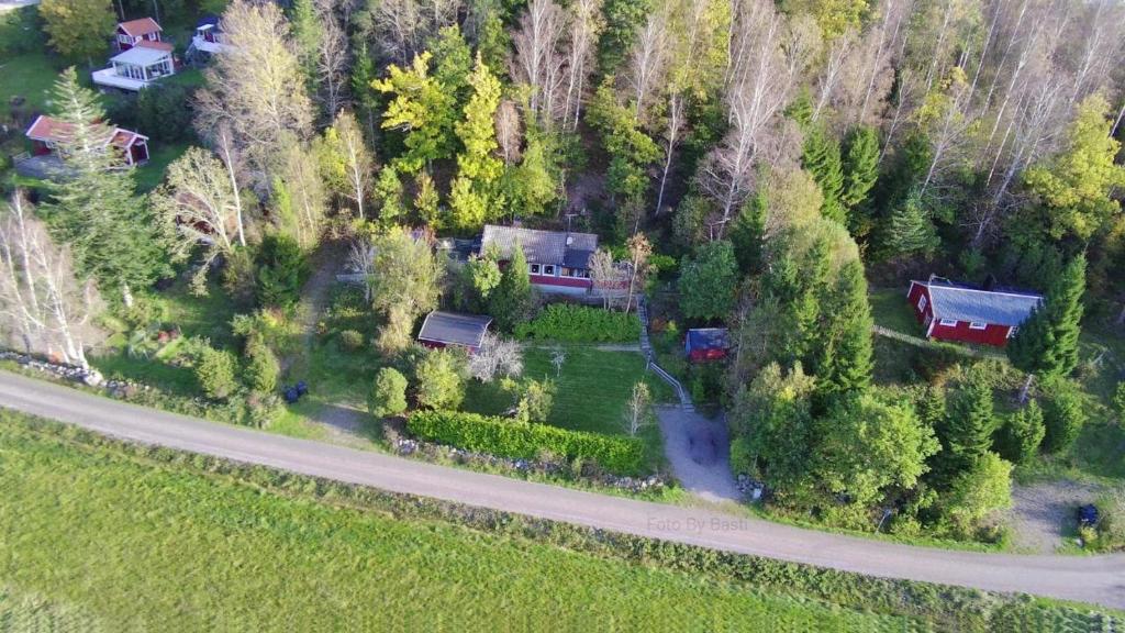 an aerial view of a house in a forest at Bergsviksvägen 5, Munkedal in Munkedal