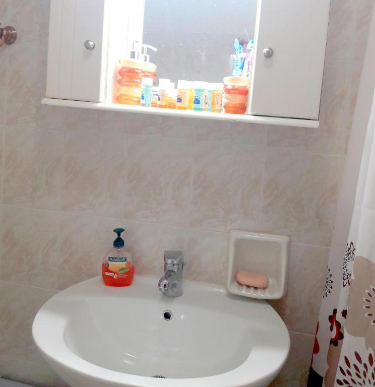 Koupelna v ubytování IOLI Apartment