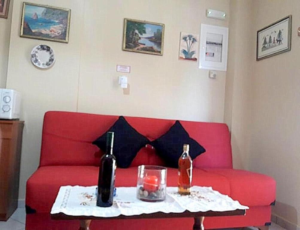 Posezení v ubytování IOLI Apartment