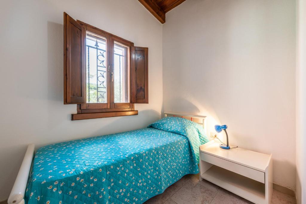 Postel nebo postele na pokoji v ubytování Villa Ambra