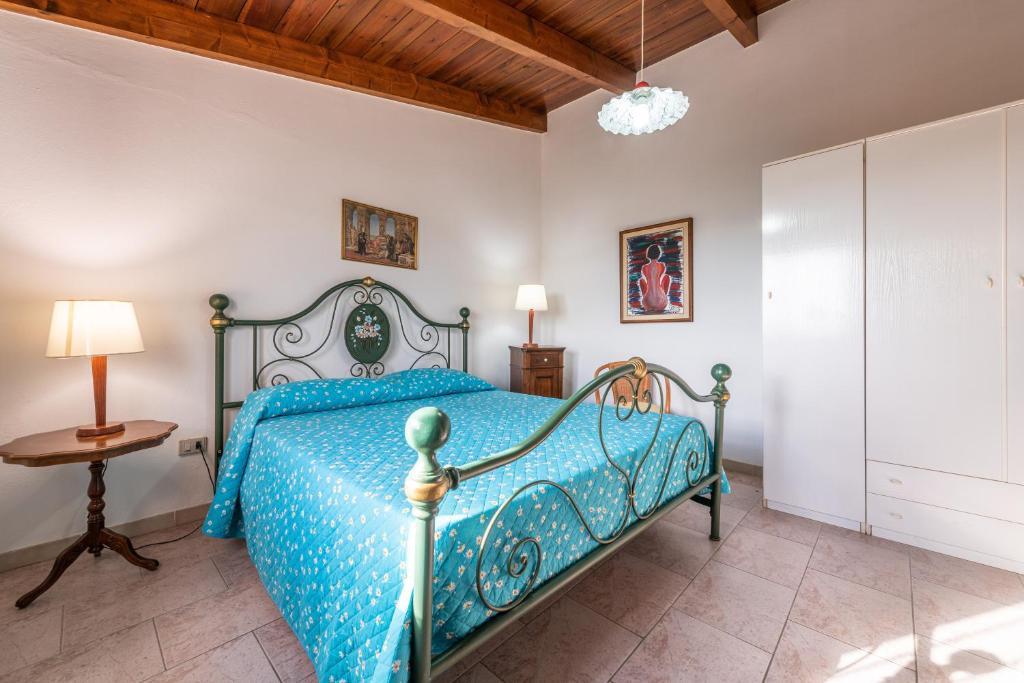 Postel nebo postele na pokoji v ubytování Villa Ambra
