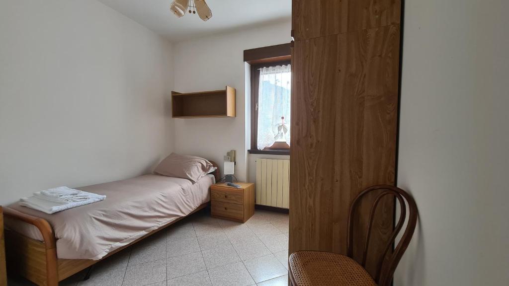 Postel nebo postele na pokoji v ubytování Albergo Meublé Aurora