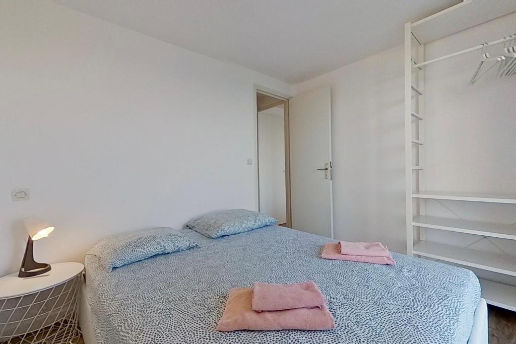 Postel nebo postele na pokoji v ubytování Résidences Sopramare