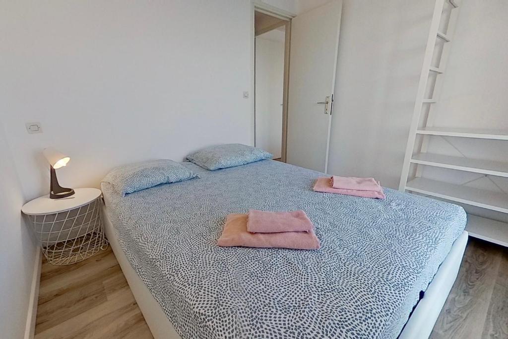 Postel nebo postele na pokoji v ubytování Résidences Sopramare