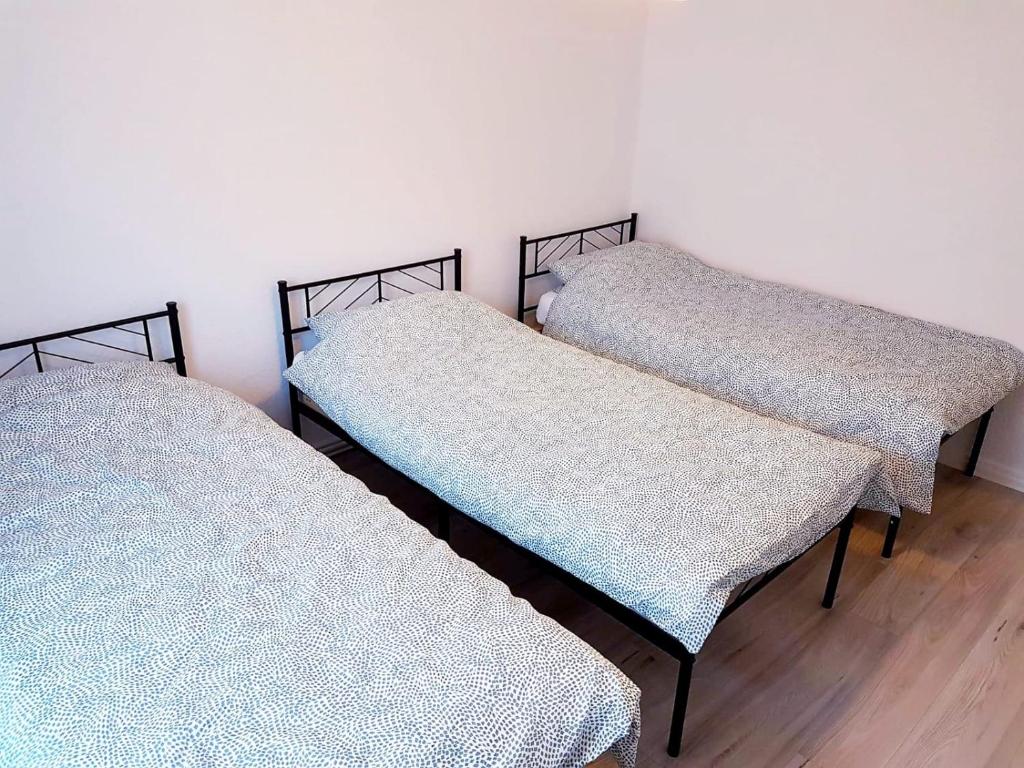 Кровать или кровати в номере Ferienwohnung Kleopatra 2.0 Messe Maschsee