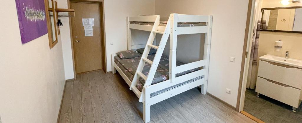 Postel nebo postele na pokoji v ubytování Ermistu Puhkeküla