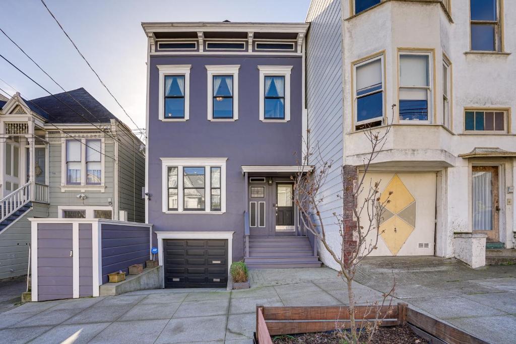 a purple house in the middle of two buildings at San Francisco Home with Hot Tub about 2 Mi to Downtown! in San Francisco