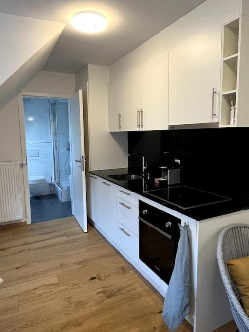 Kuchyň nebo kuchyňský kout v ubytování Central & modern penthouse-studio with balcony & air-condition