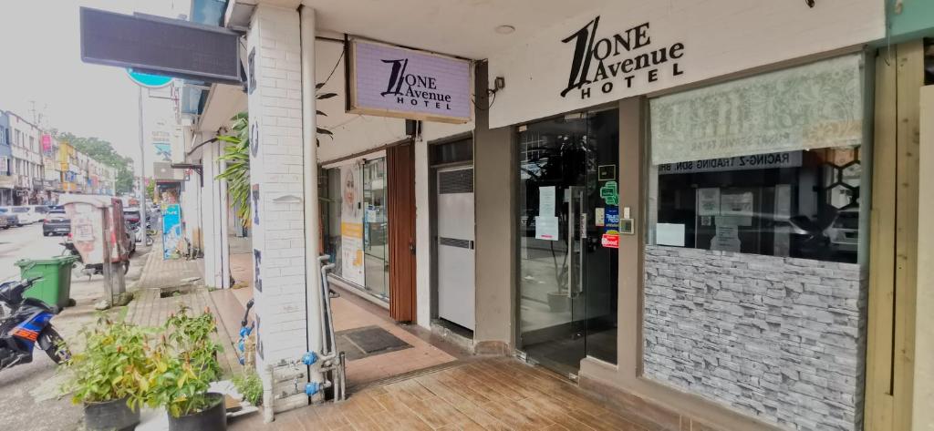 a store front with a sign for a home mortgageuterastery at One Avenue Hotel Balakong in Seri Kembangan