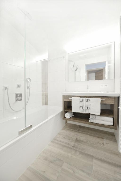 Koupelna v ubytování Hotel Alpina Superior