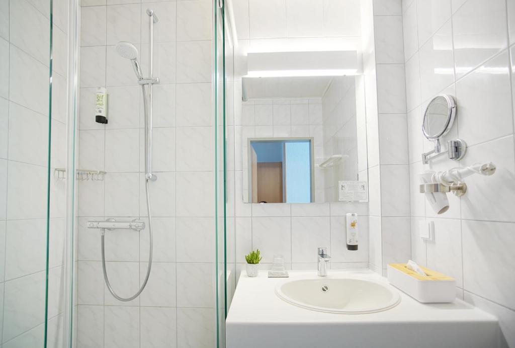 Koupelna v ubytování Hotel Bessunger Forst