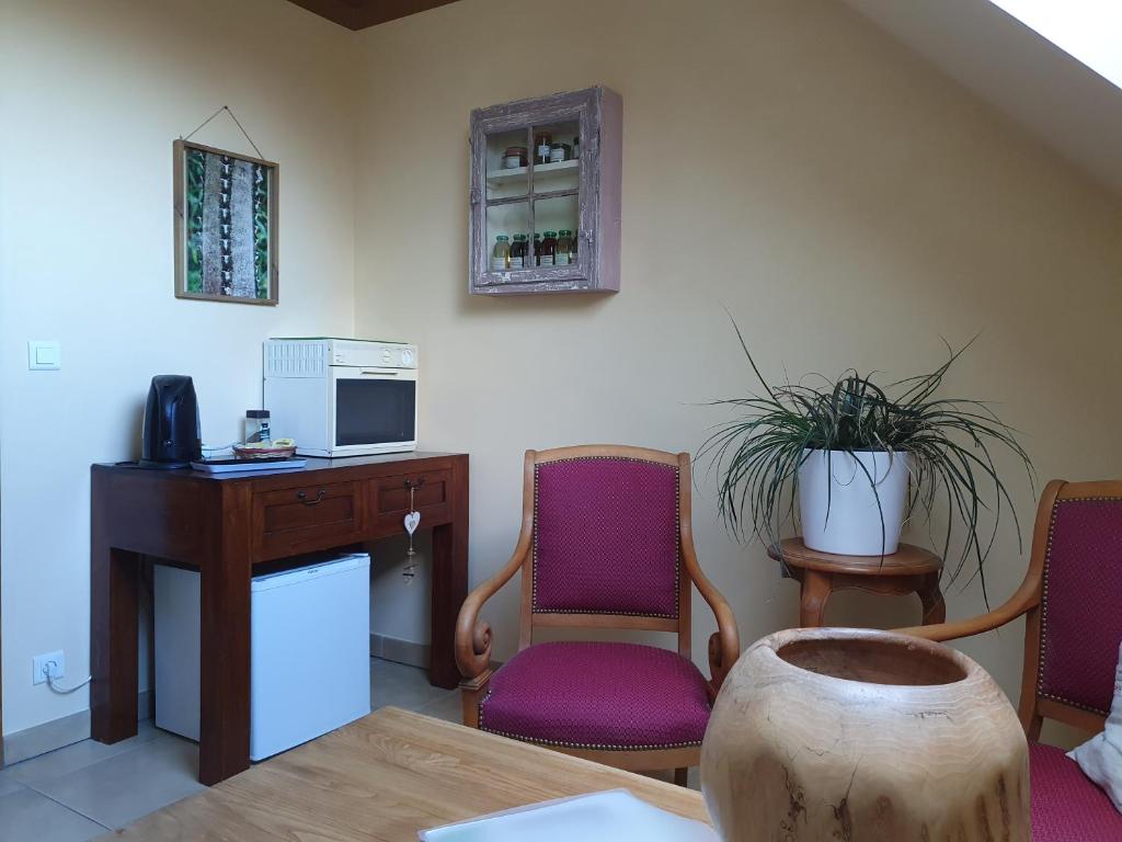 Kuchyň nebo kuchyňský kout v ubytování chambre d'hôtes de charme, un temps en forêt