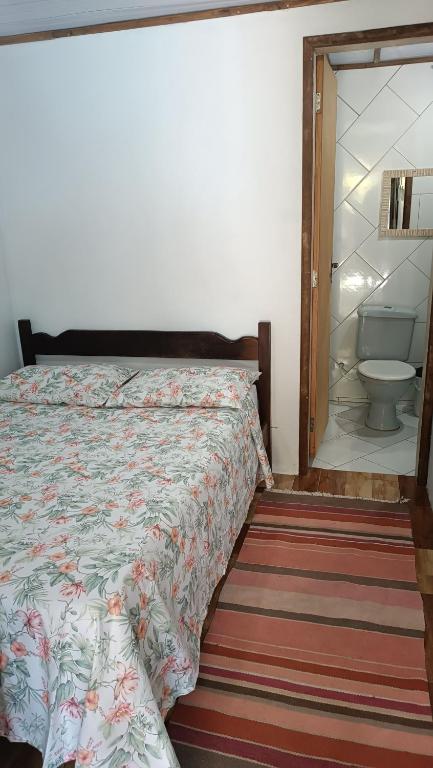 Cama ou camas em um quarto em Pousada Sobre as Ondas - ILHA DO MEL - PR