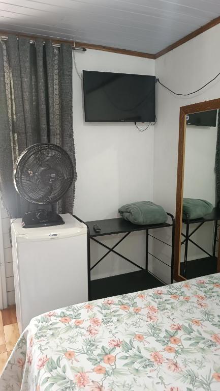 Cama ou camas em um quarto em Pousada Sobre as Ondas - ILHA DO MEL - PR