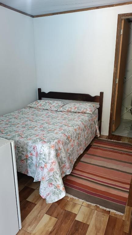 Cama ou camas em um quarto em Pousada Sobre as Ondas - ILHA DO MEL - PR