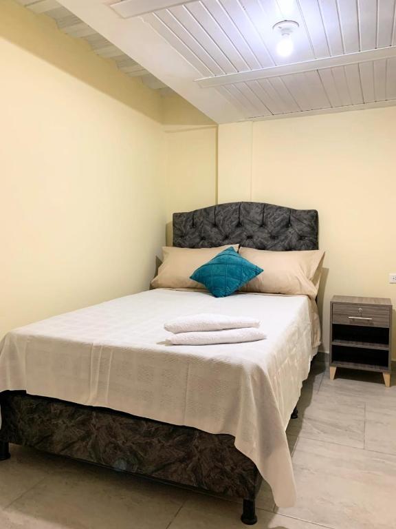 Postel nebo postele na pokoji v ubytování Posada RoRi