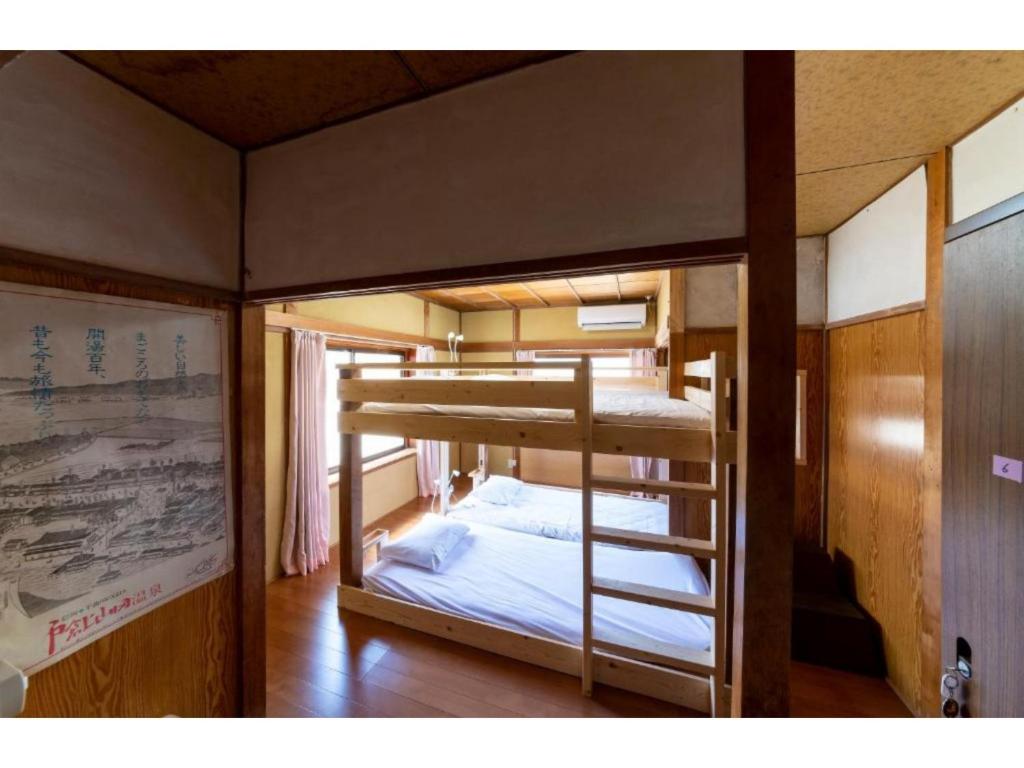 a couple of bunk beds in a room at Showa No Toraya - Vacation STAY 61518v in Chikuma