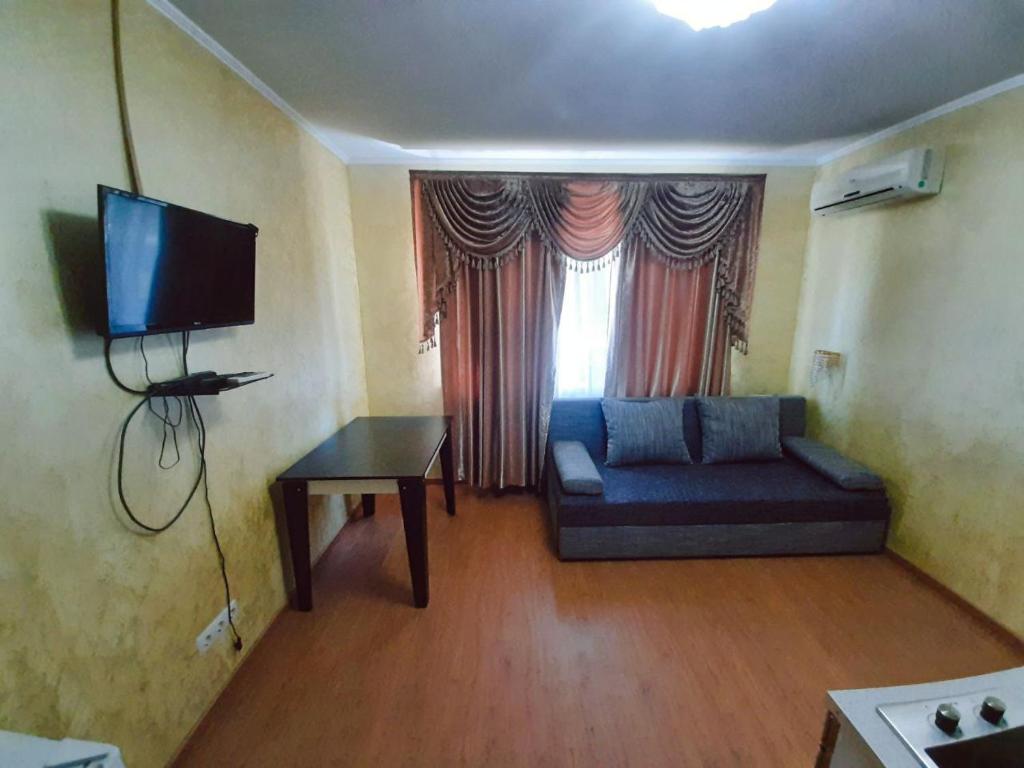 TV a/nebo společenská místnost v ubytování Guest House Montreal