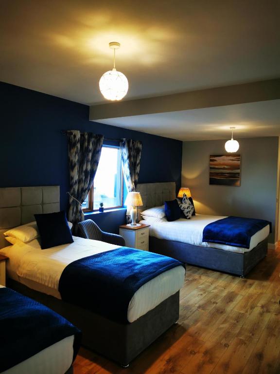 Postel nebo postele na pokoji v ubytování Ocean Heights B&B