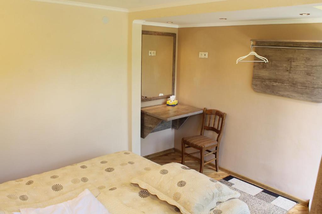 Postel nebo postele na pokoji v ubytování MagHay B&B Hotel in Vanadzor