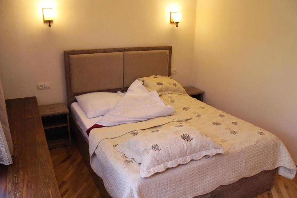 Postel nebo postele na pokoji v ubytování MagHay B&B Hotel in Vanadzor
