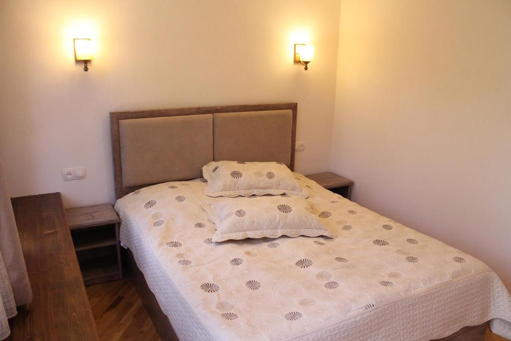 Postel nebo postele na pokoji v ubytování MagHay B&B Hotel in Vanadzor