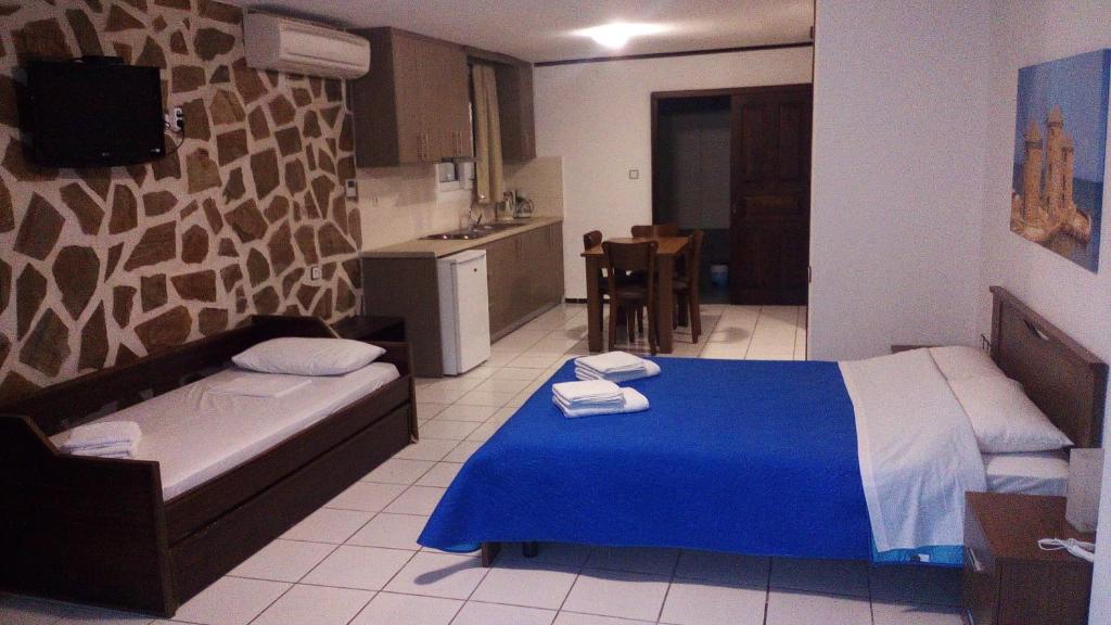 Кровать или кровати в номере Amimaya Apartments