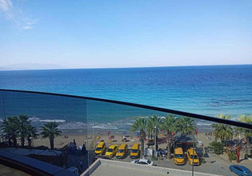a view of the beach from the balcony of a resort at Kusadasi Seasight in Kuşadası