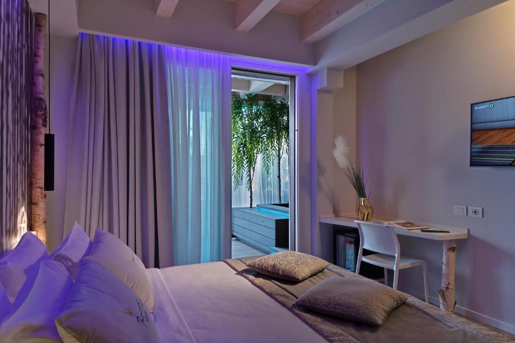 Postel nebo postele na pokoji v ubytování Hotel Locanda Al Piave ***S