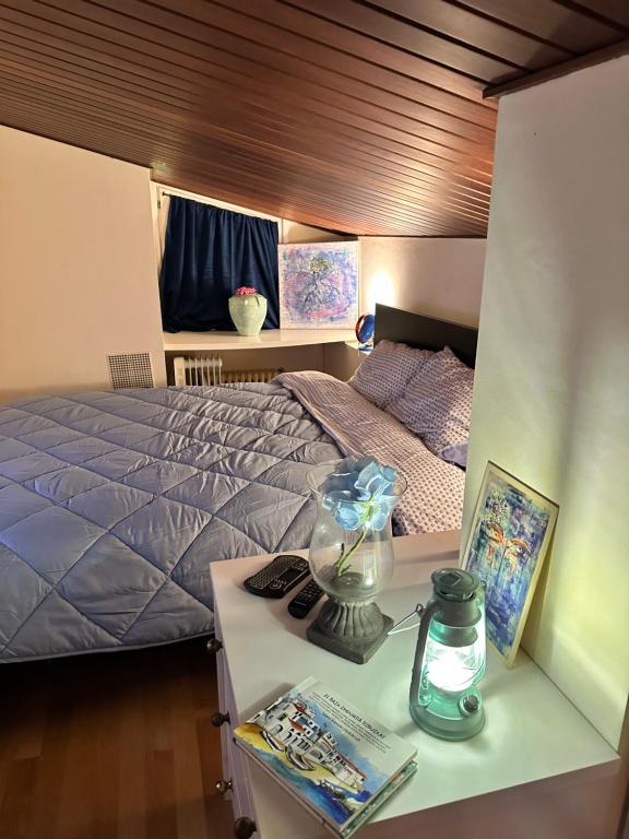 Postel nebo postele na pokoji v ubytování Solo Atico Guest Suites