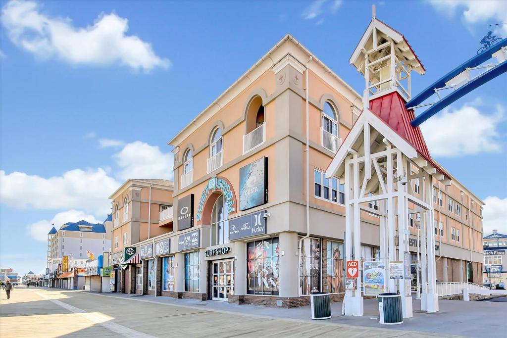 a building with a windmill on the side of it at Oceanfront Villa 2(103) - Boardwalk oceanfront in Ocean City