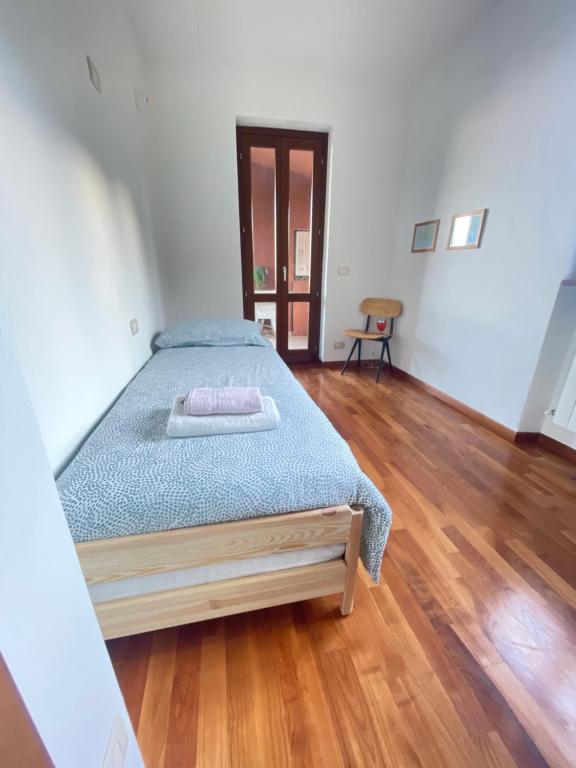 Letto o letti in una camera di Casa Calma
