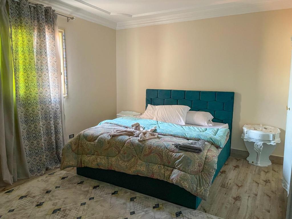 Postel nebo postele na pokoji v ubytování Chez l'ami hotel
