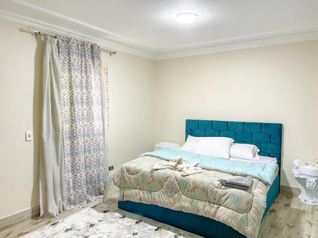 Postel nebo postele na pokoji v ubytování Chez l'ami hotel