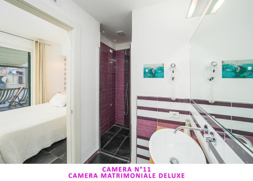 Posteľ alebo postele v izbe v ubytovaní I Tibei Guesthouse Affittacamere