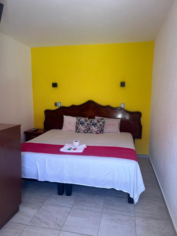 Postel nebo postele na pokoji v ubytování Hotel Capri Playa a una calle de la Playa Regatas