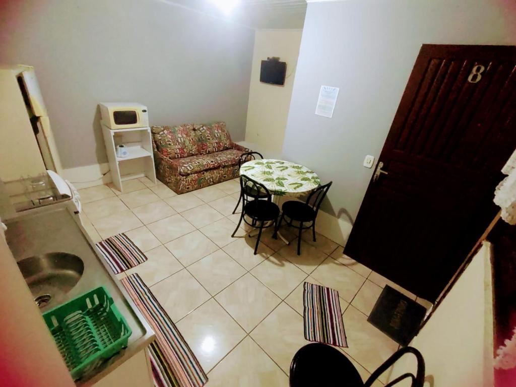 Гостиная зона в 08apto Residencial Praia de Capão da Canoa