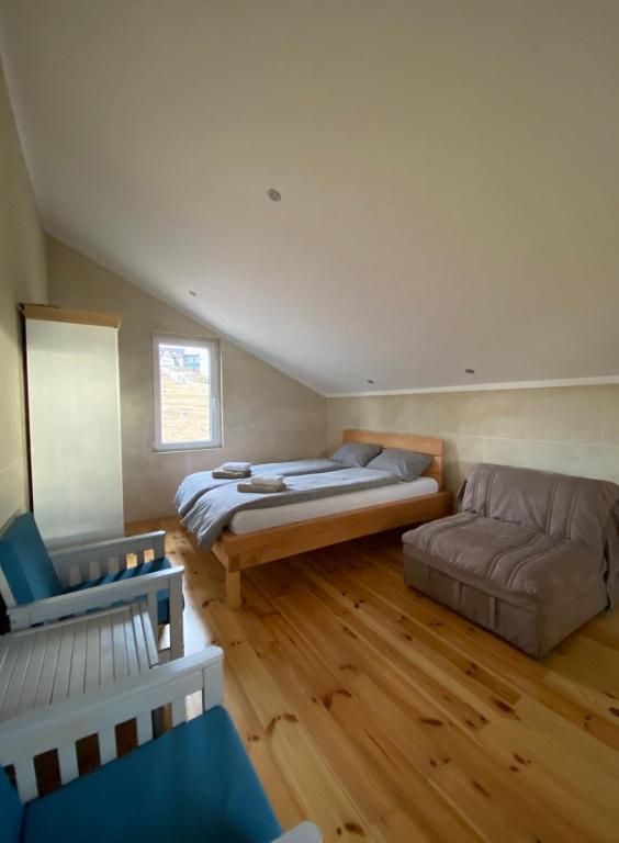 Rúm í herbergi á Apartmani kod Pančevca
