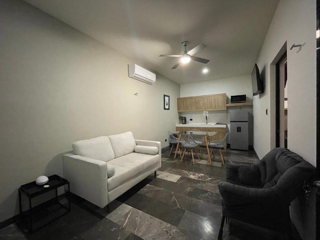 Kuchyň nebo kuchyňský kout v ubytování Hotel Suites La Negra