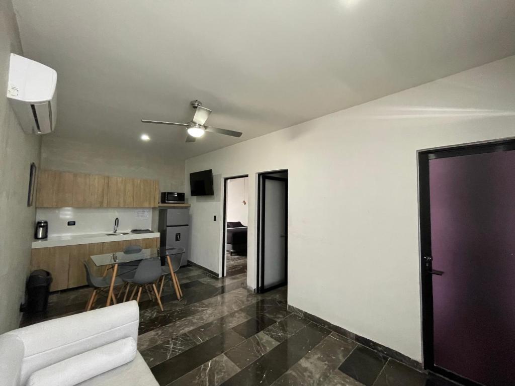 Kuchyň nebo kuchyňský kout v ubytování Hotel Suites La Negra