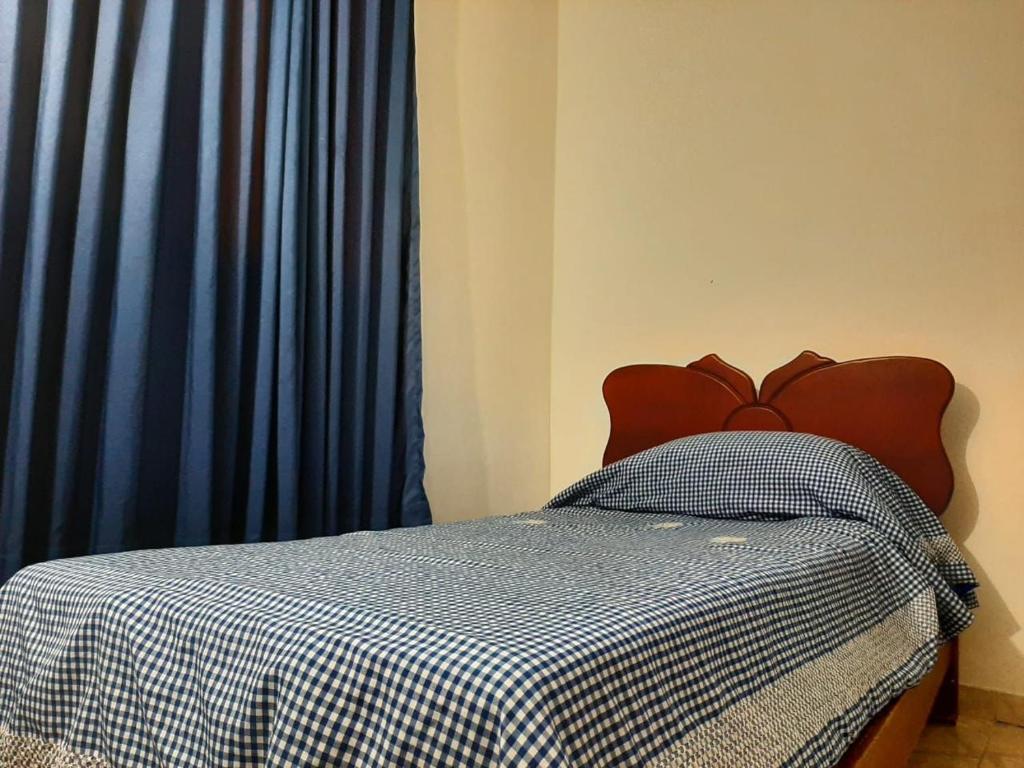 Postel nebo postele na pokoji v ubytování Valle lanceros Melgar