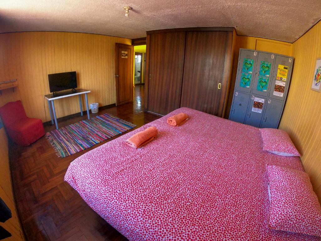 Postel nebo postele na pokoji v ubytování Arequipay Hostel