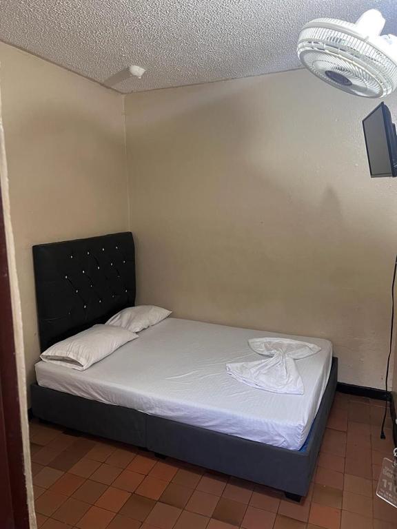 Postel nebo postele na pokoji v ubytování Nuevo hospedaje benny