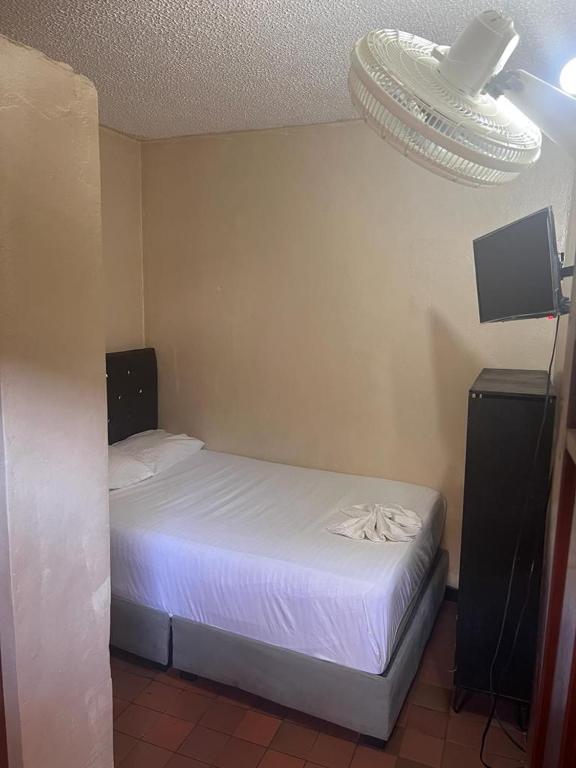 Postel nebo postele na pokoji v ubytování Nuevo hospedaje benny