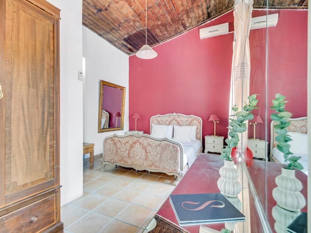 Postel nebo postele na pokoji v ubytování Cornaro House