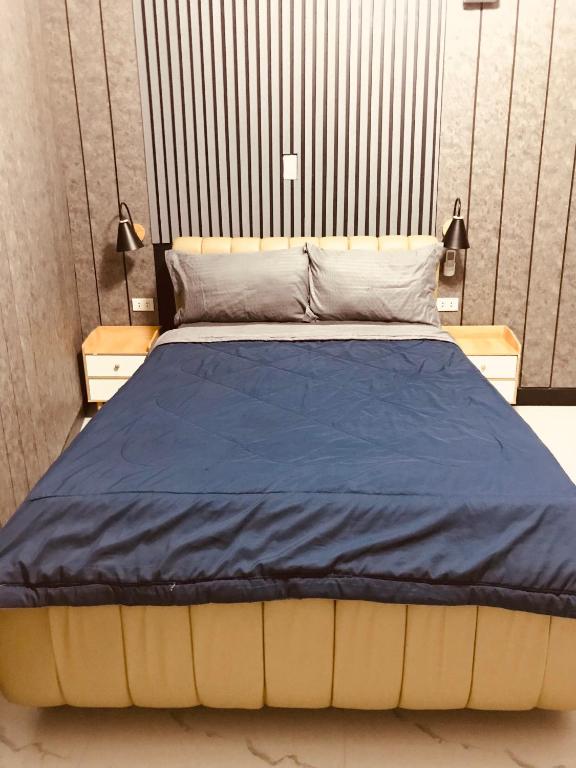 Postel nebo postele na pokoji v ubytování Clark CU Hotel