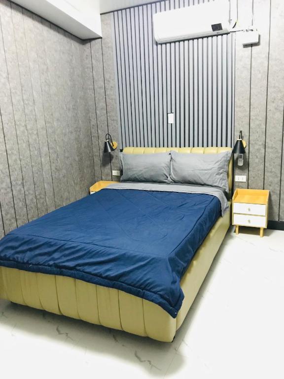 Postel nebo postele na pokoji v ubytování Clark CU Hotel