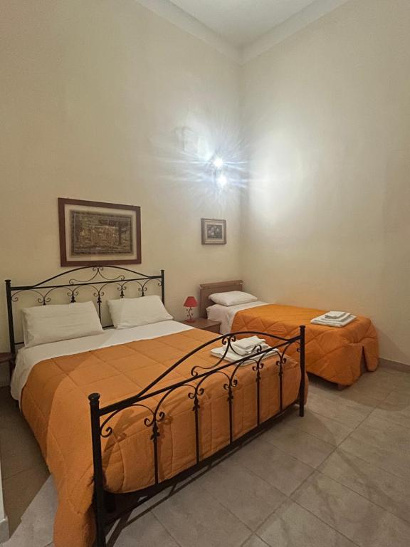 Postel nebo postele na pokoji v ubytování Salento b&b Trepuzzi